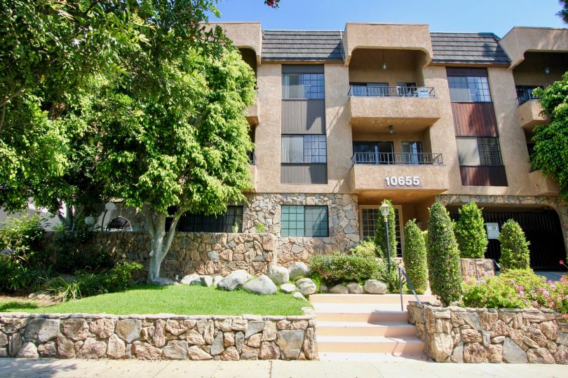 The trees in kelton villas of westwood are very nice to see in this picture.