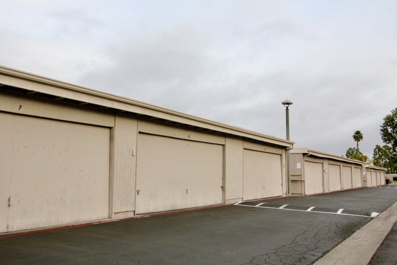 A row of storage units lined on the street of New World Condos.