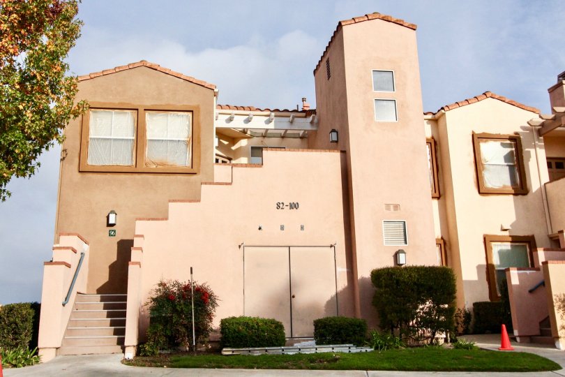 A multi level Spanish style building houses several units in Seacove Villas.