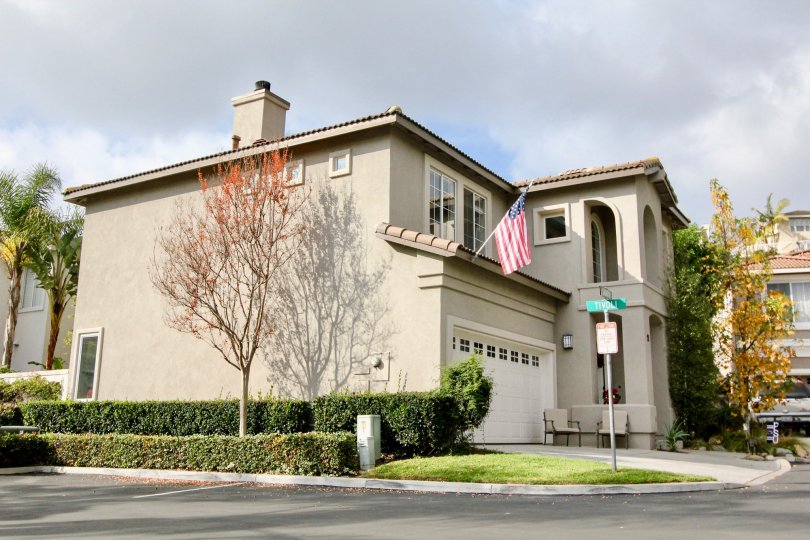 a warm day in the tivoli ll with house that has front of trees, windows