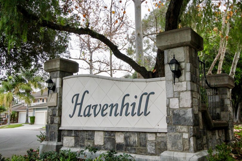 THE HOUSE IN THE HAVENHILL WITH HAVENHILL WALL, PLANTS, TREES