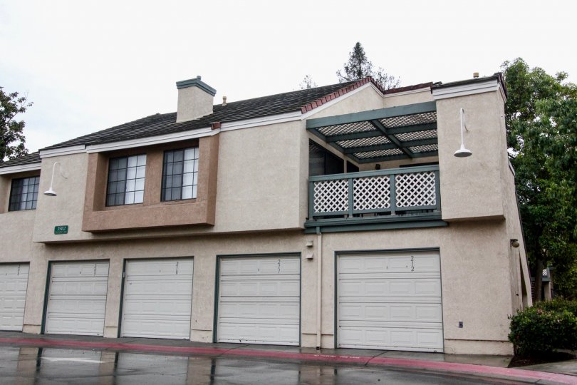 An attractive house with large garage doors in the Evergreen village community