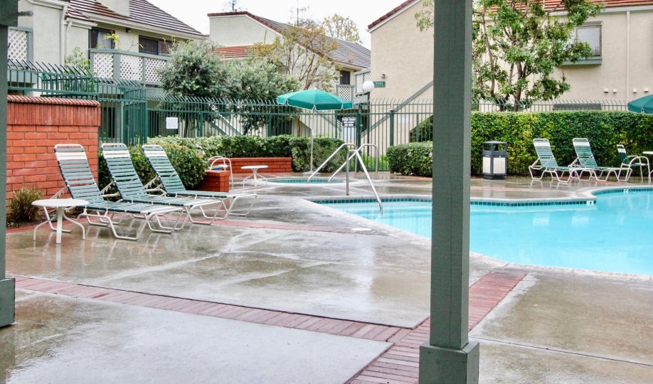 Awesome swimming pool between villas with sitting and garden in Evergreen Village of Anaheim