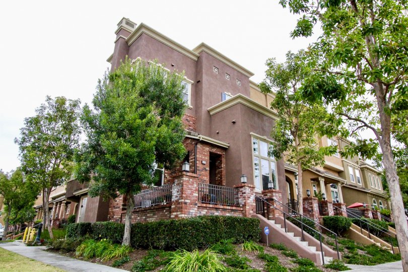 THE LARGE HOUSE WITH PLANTS, TREES ARE LOCATED IN ANAHEIM CITY