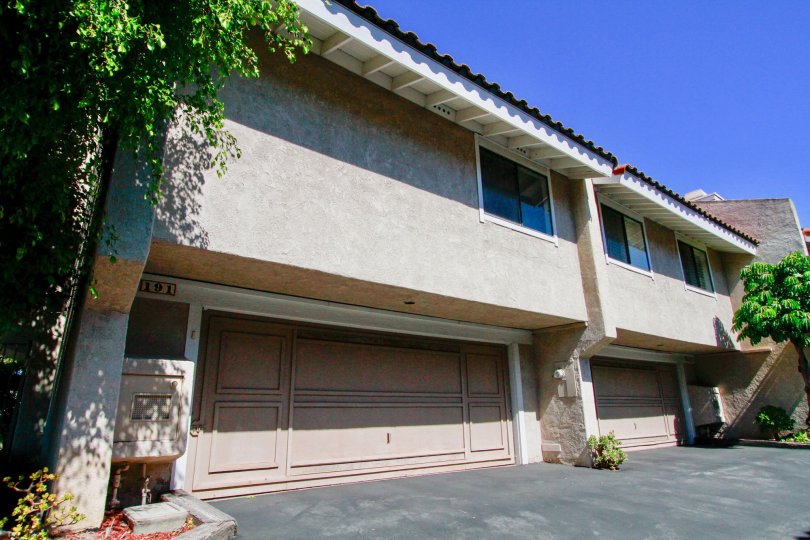 Fairview Village Costa Mesa California factory like appearance with long road with glassy window