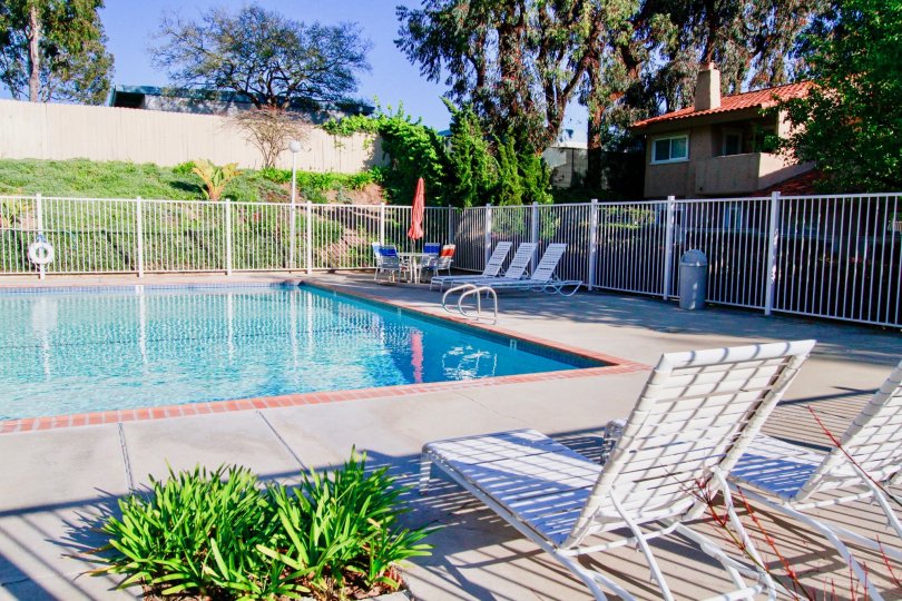 Westbluff Village Costa Mesa California house near swimming pool cover gate blue water