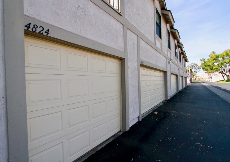 A sunny day at the back door of some house in the Influential Townhomes community.