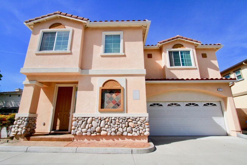 Sunny picture of a home in The Cove community in Cypress, California.