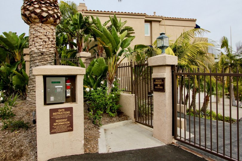 Side gate with decorative plant in Point Vista community, Dana Point, CA