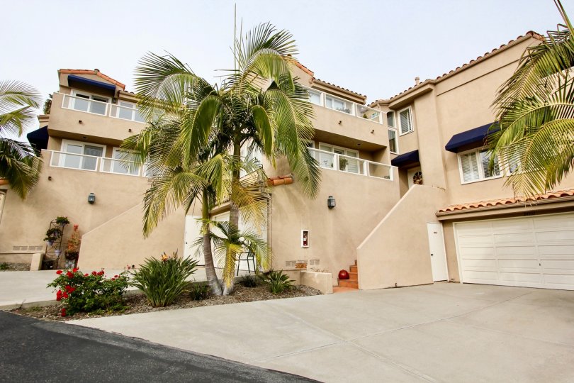 a warm day in the point vista with house that has glass window and parking door