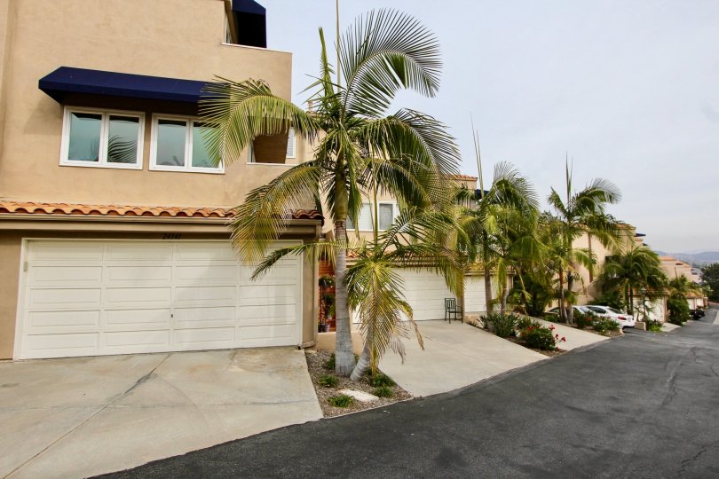 a warm day in the point vista with house that has close parking door and glass windows