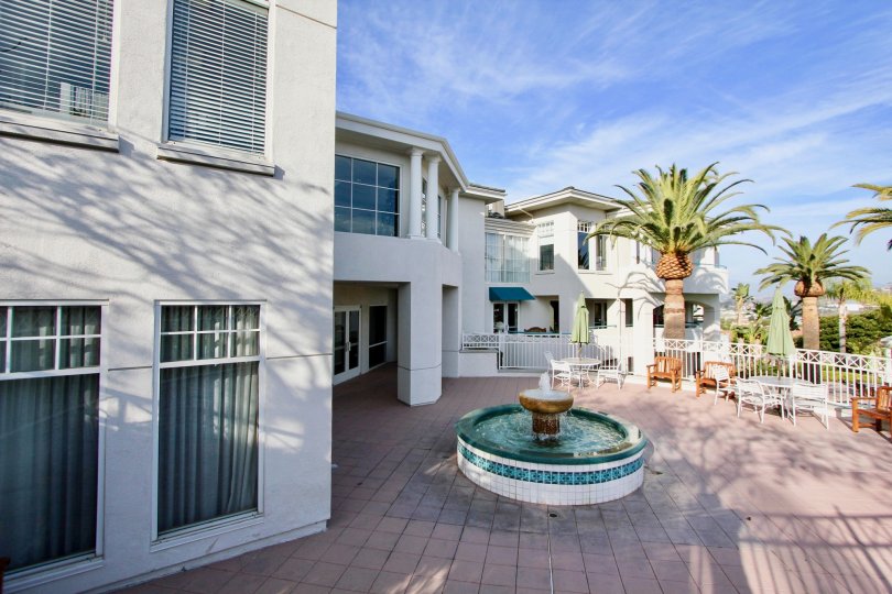 At center of the Apartment in The fountains at Sea Bluffs has fountain and tables