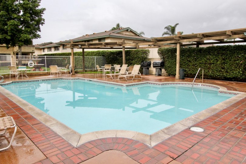 Fountain Crest Valley California good roofing model and unique flooring tiles in a swimming pool side