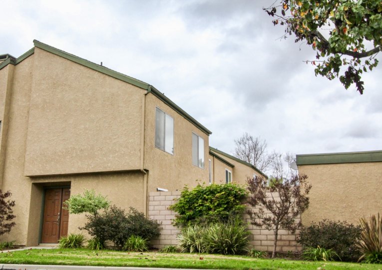 Tan residential housing in Fountain Park community.