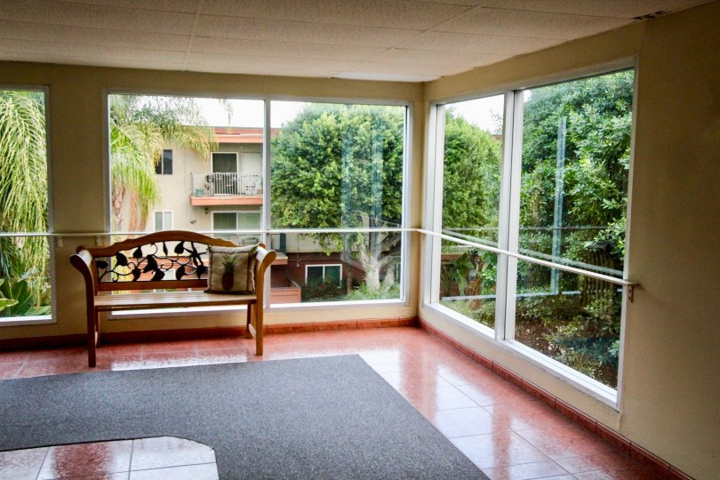 Inside view with large open windows from inside the community of Club Acacia.
