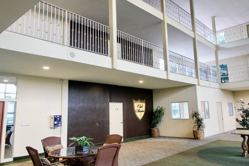 Multiple level building with two level wraparound porches in Club Acacia/