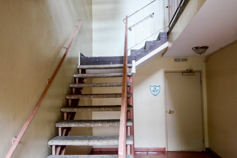 Stone stairs leading up to upper floor at Club Acacia.
