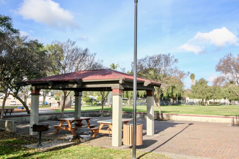 The park in Fullerton fountains has lawn with picnic tables and chairs