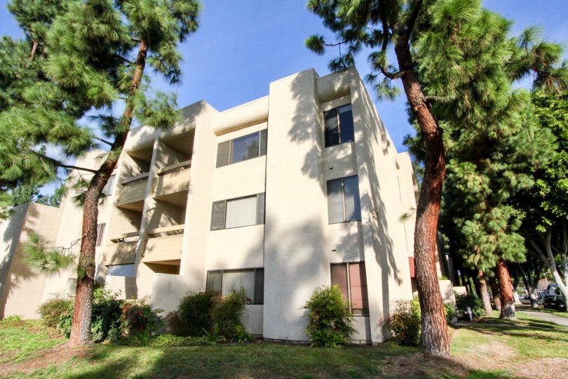 Three level housing with large windows in Fullerton Fountains community.