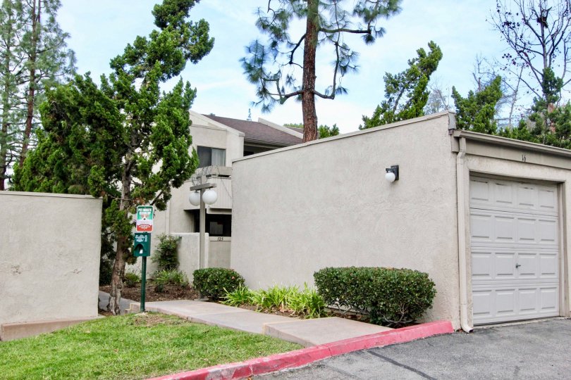 Residential housing and garage units in Park Ridge community.