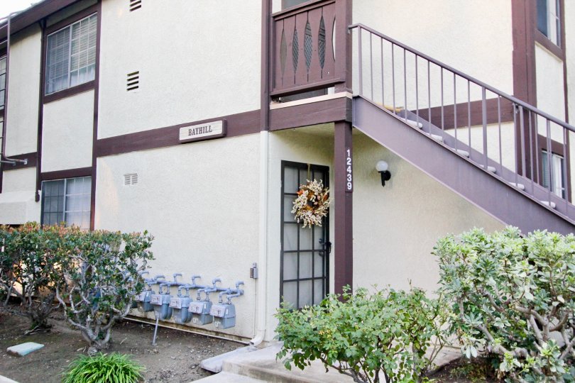 The Les Jardins in the Garden Grove with House and trees