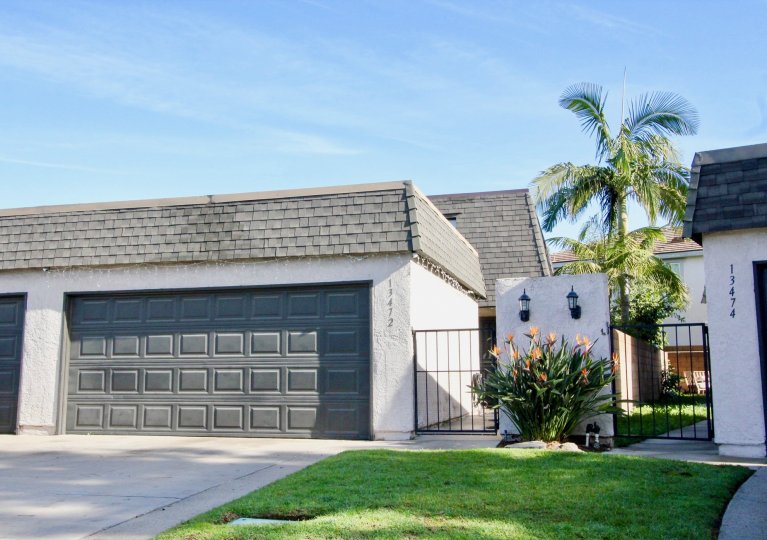 THIS SHOWS THE ENTRANCE WAY TO THE HOME THAT SHOWN IN THE COMMUNITY OF WILLOW TRAIL, THAT HAS THE LAWN, PLANTS, TREES