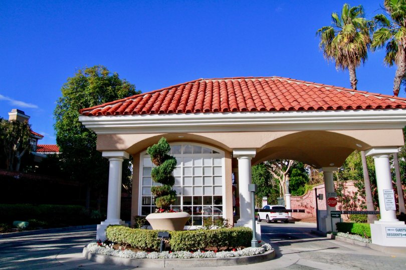 A red clay roof under a clear blue sky at the Seacliff on the Greens community