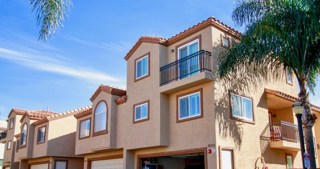 Seacliff Palms apartment buildings with garages and balconies.