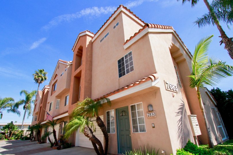 Solimar Huntington Beach California building is light rose and brown color paint apply window and glass attached side steps attached door color gary