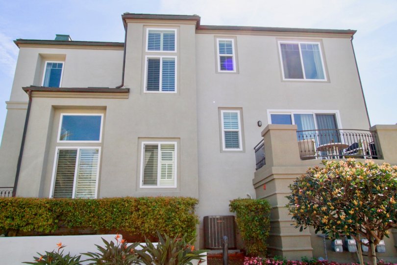 Surfcrest Huntington Beach California building color light window and glass attached house near compont wall and steel attached