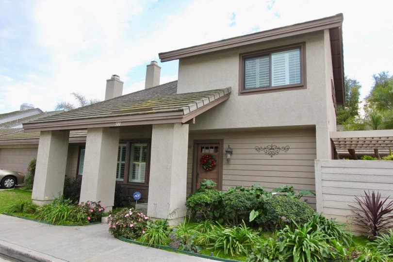 An 80's style condominiums with lots of plants at Garden Estates in irvine CA