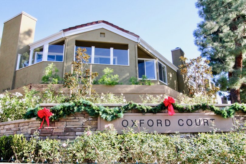Wonderful front view of a residential house with beautiful garden to spend time with family members in Oxford court at Irvine, CA