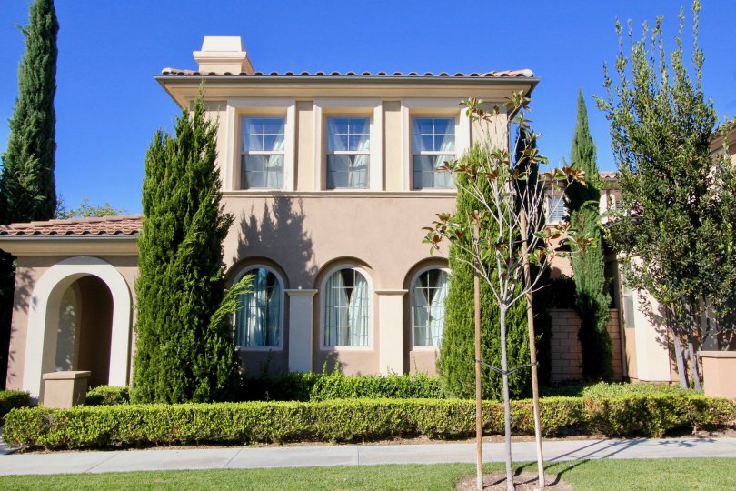 Bright blue sky behind a beautiful home in Irvine California