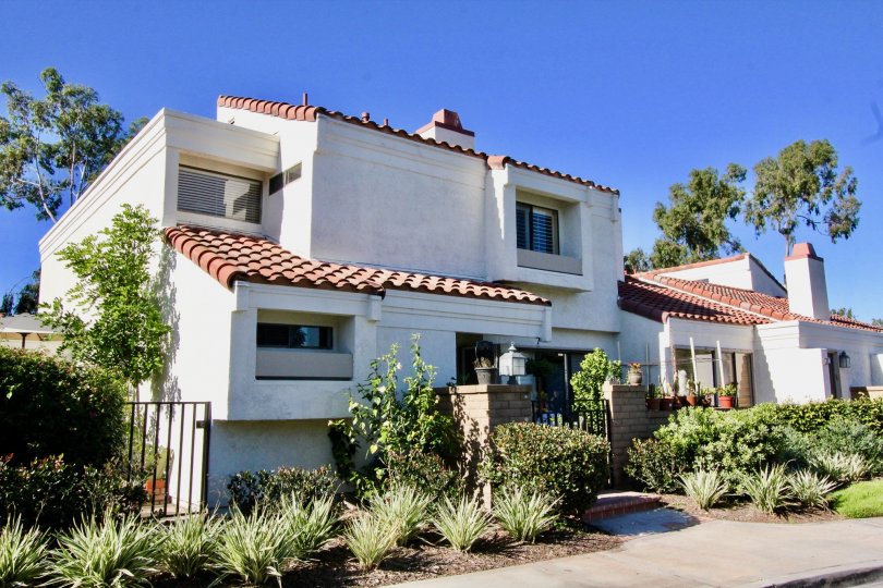 front view of the building decorate with plants and flowers in Villas at RSJ