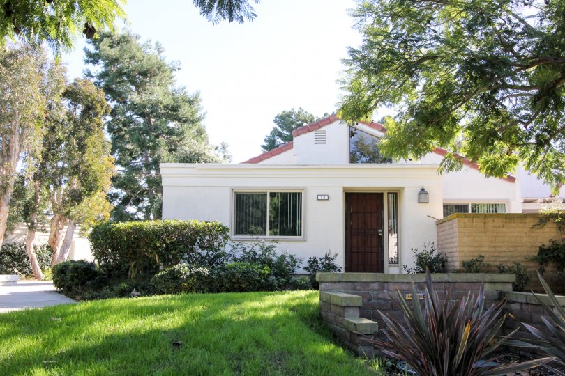 Marvellous view of an Independent villa with lawn and trees in Villas at RSJ of Irvine