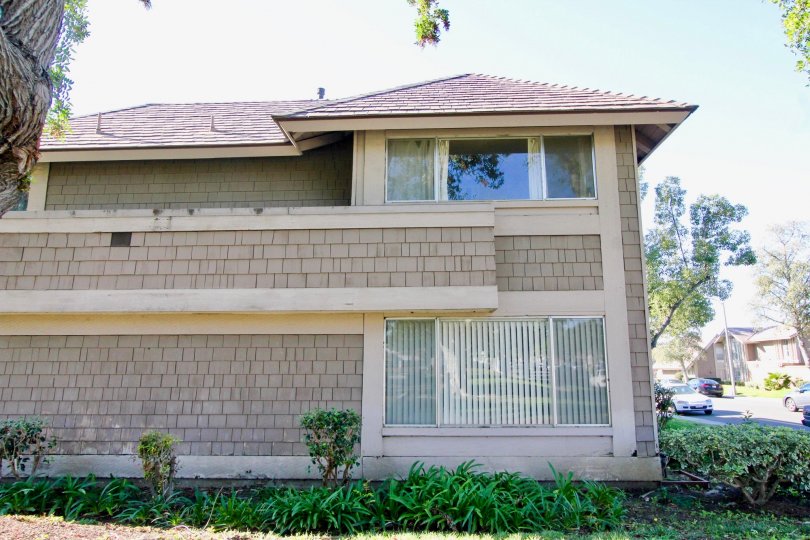 A two-storey unit in the Walnut Square community clad in shingles.