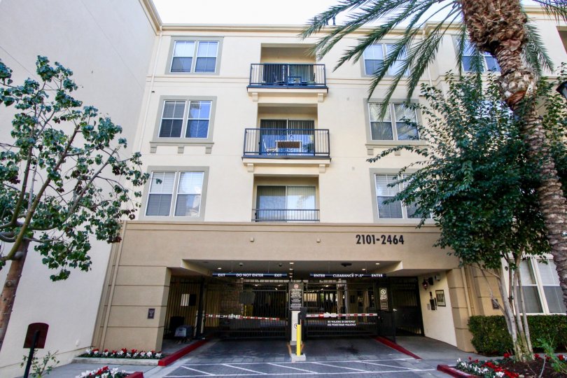 A large parking area underneath a four story condo building at Watermarke in Irvine CA