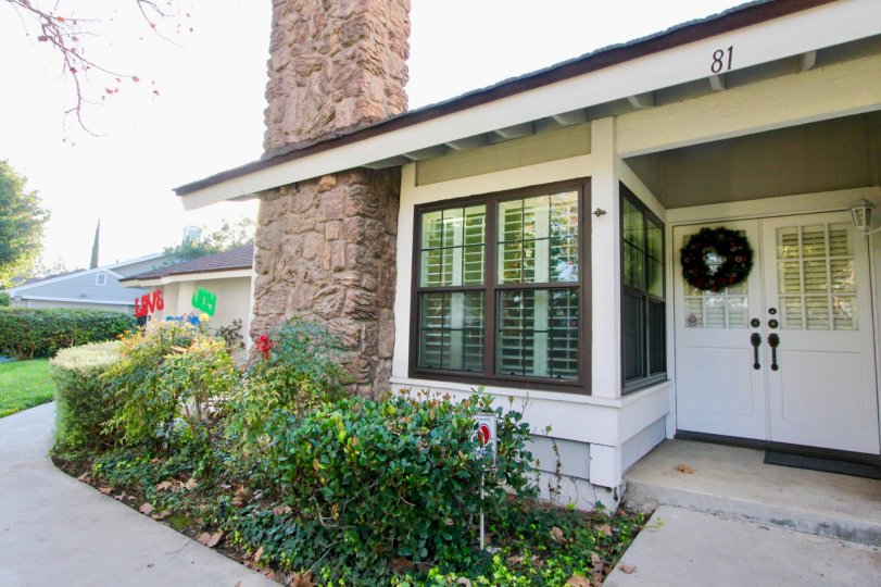 Beautiful front door entrance with cozy fireplace in Woodbridge Estates