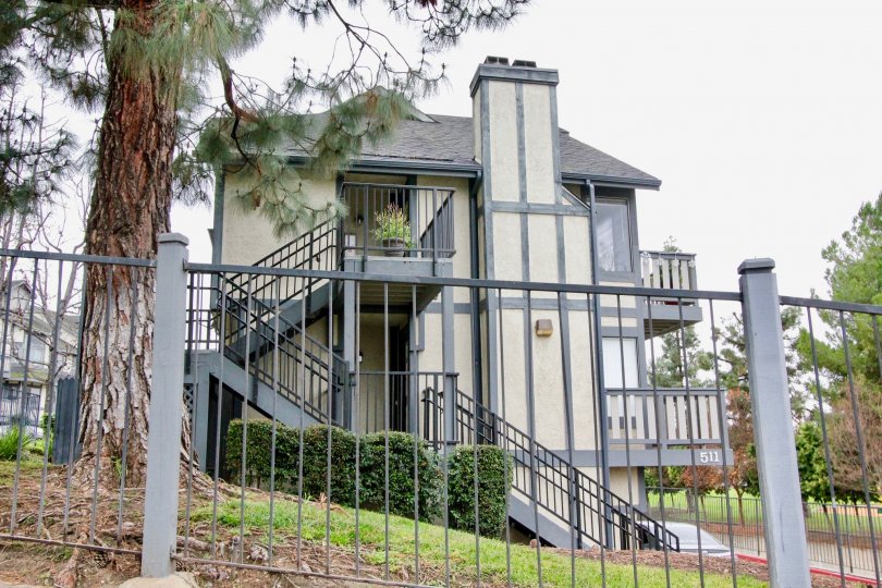 An independent two floor house in the Heritage Walnut with steps having iron grills and compound constructed with iron grills