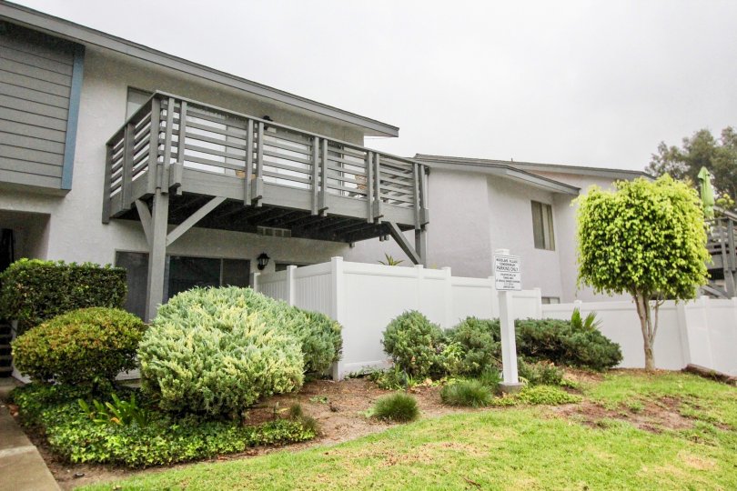 Villa in Woodlake Village is wet because of raining with meadows and cutting bushes