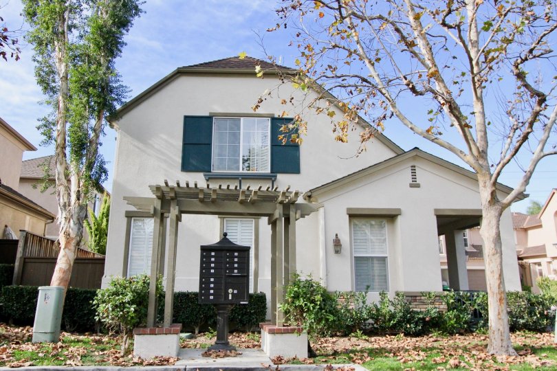Villa with trees and entrance view of Sycamore Grove of Ladera Ranch