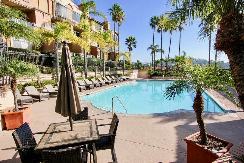 THE VILLAS IN THE LA VISTA WITH THE SWIMMING POOL, UMBRELLA, CHAIRS