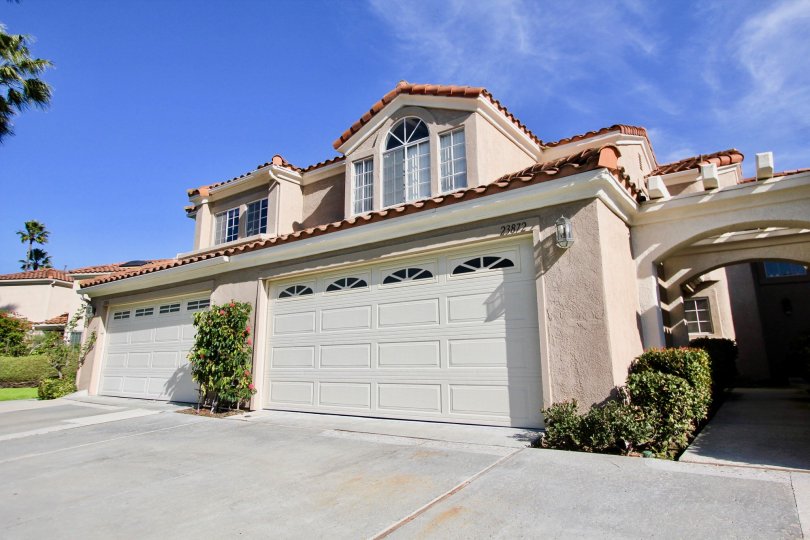 A white color door in front of a house in the Laguna Niguel.