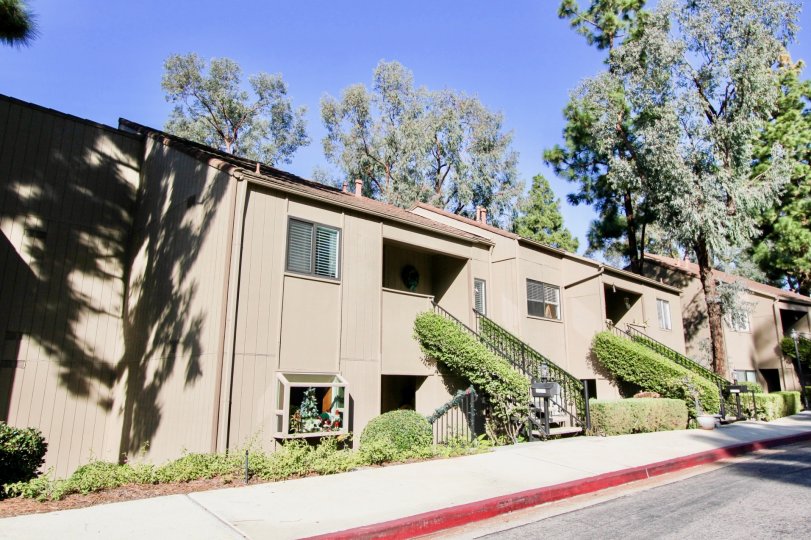 An old style building with trees in the The East Nine.
