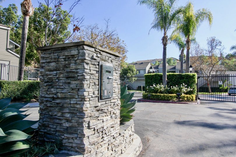 Villa point with gate and palm trees in Village Niguel Terrace I of Laguna Niguel