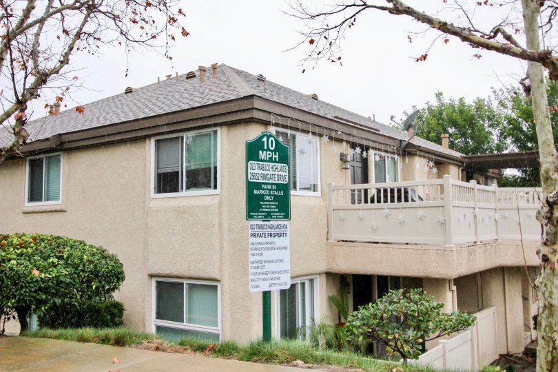 A tan apartment complex with decrations in Old Trabuco Highlands community in Lake Forest, California.