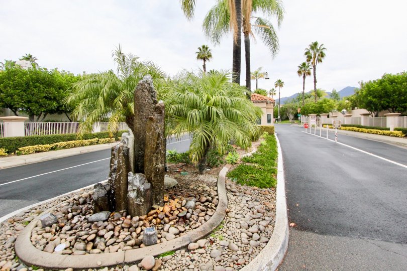 A community entrance path ways to the both side with traffic symbols in Palmia Courts 2.