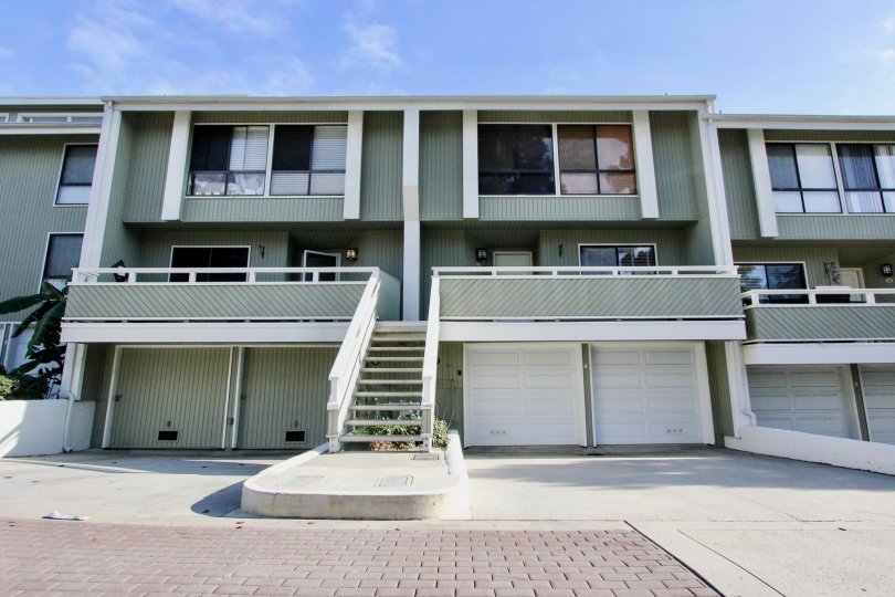 A sunny day in the Newport Crest with a terrace and clear sky.