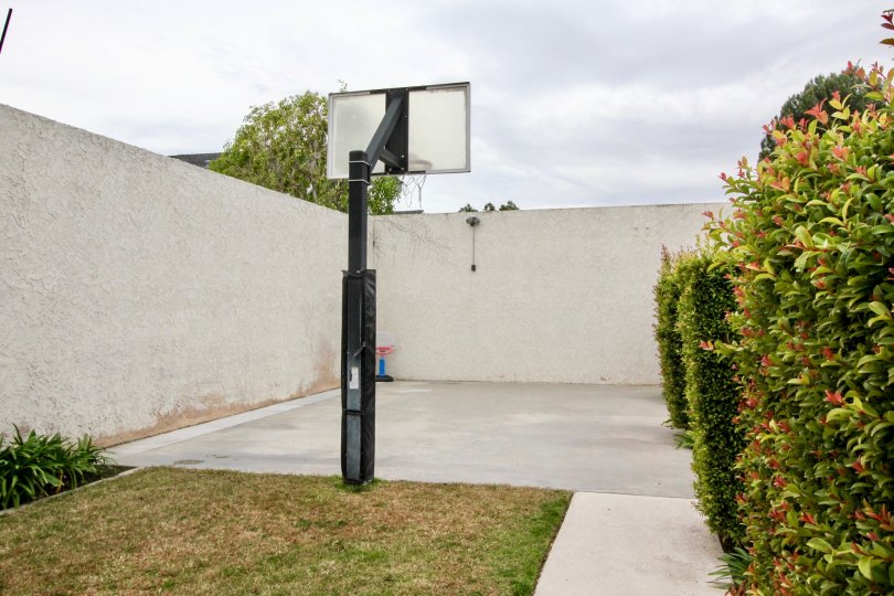 The basketball court in Fletcher Avenue community with a fence