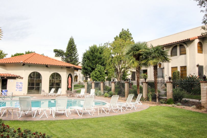 Beautiful neighborhood house with two stories and a lush green front yard